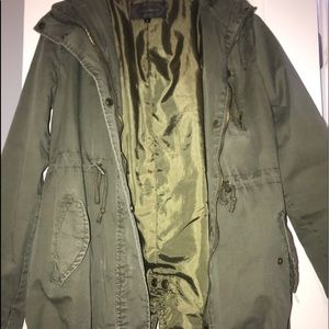 Rain/ dark green jacket